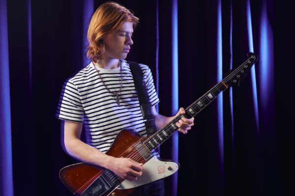 “I remember there was a video of Gary Moore and he played Red House on this Fiesta Red Strat, and I thought it was just the most incredible thing”: Is Toby Lee Britain’s next blues-rock superstar? … from Guitarworld