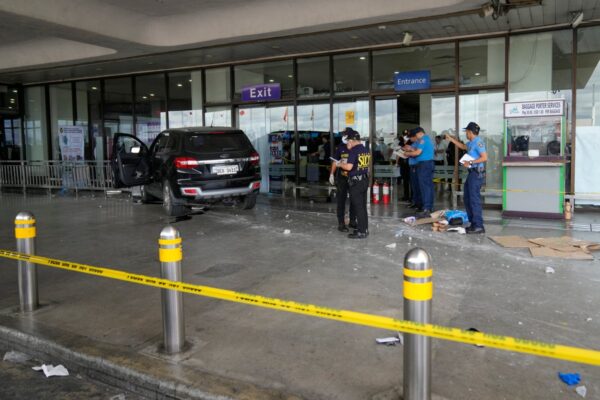 SUV removed from scene after crashing through Manila Airport entrance killing girl, 4 … from the Independent Richard Gilzene