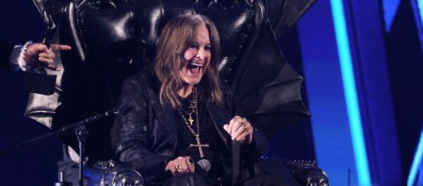 Ozzy Osbourne Visits Black Sabbath Mural, Gifts Farewell Concert Tickets to Artist … from the American Songwriter Paige Gawley