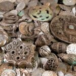 Angler digging for worms uncovers medieval cauldron filled with coins … from the Independent Nicole Wootton-Cane