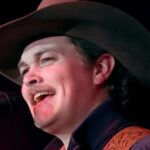 Zach Top Jokes He Feels Like “A Male Stripper” After Brief Stint in Citadel Hat During Charleston Show … from the American Songwriter Erinn Callahan